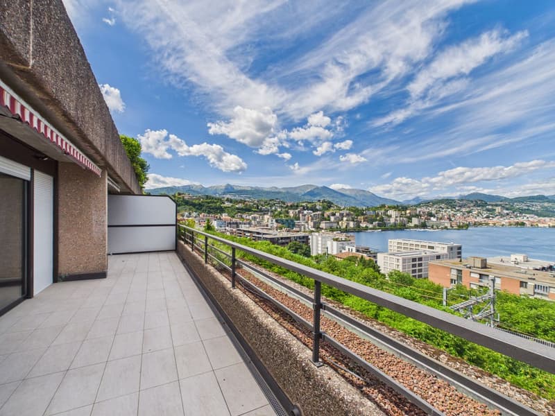 Panoramawohnung mit traumhaftem Blick auf den Golf von Lugano (21)