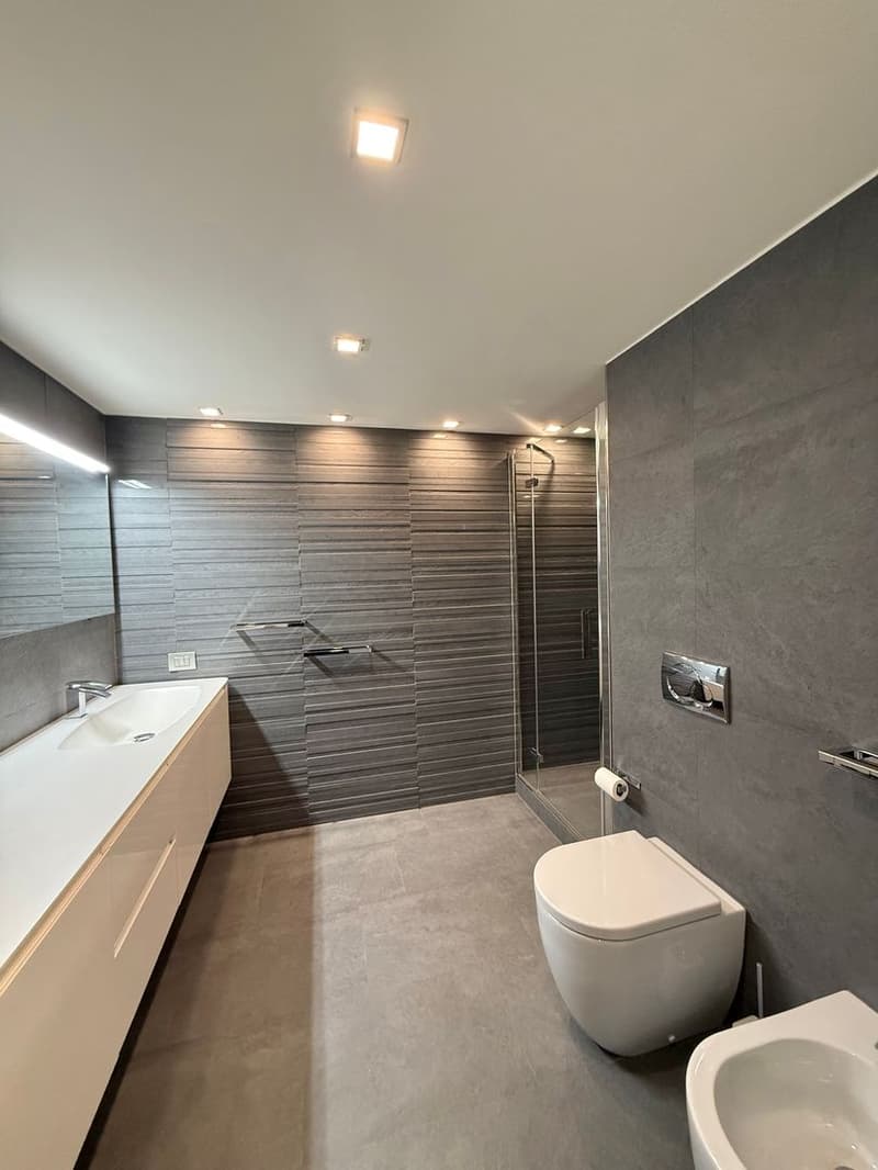 Appartamento ammobiliato di 2,5 locali con giardino e balcone a Morcote (10)