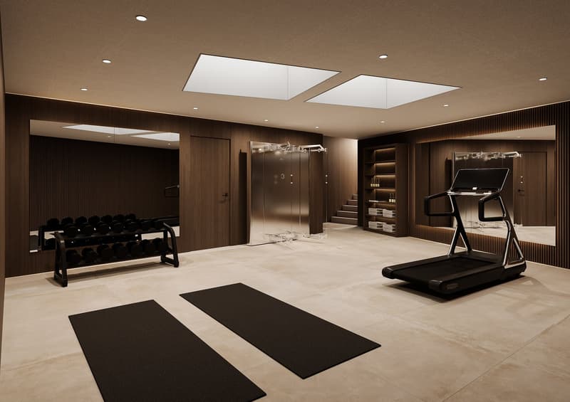 Gym equipments, treadmill, yoga mats, dumbbell rack, mirrored walls, wooden paneling, recessed lighting