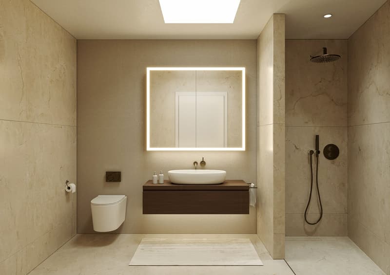 modern bathroom with beige tiles, white sink, mirror, toilet, shower, and a rug