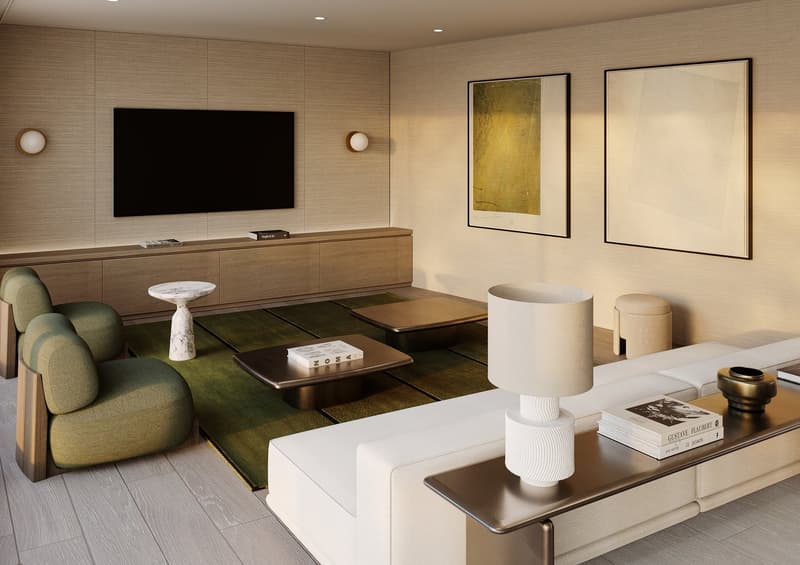modern style living room with white sofa, coffee tables, armchairs, flat screen TV, carpet, art works