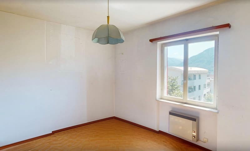 Zentrales Mehrfamilienhaus in Minusio mit Seesicht und Ausbaupotenzial (11)