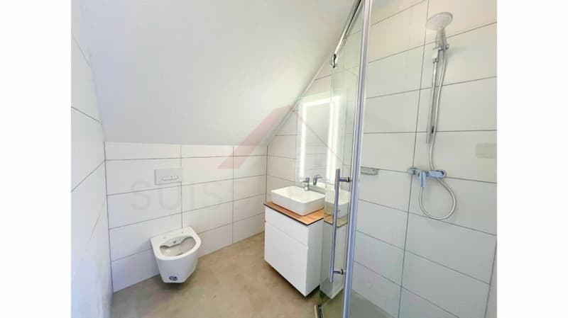 Maison multifamiliale avec 3 appartements rénovés et beau potentiel locatif à Courrendlin (4)