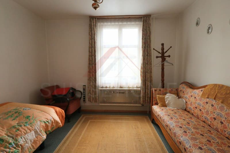 Delémont - Propriété avec 3 appartements et fort potentiel de valorisation dans un quartier central (7)