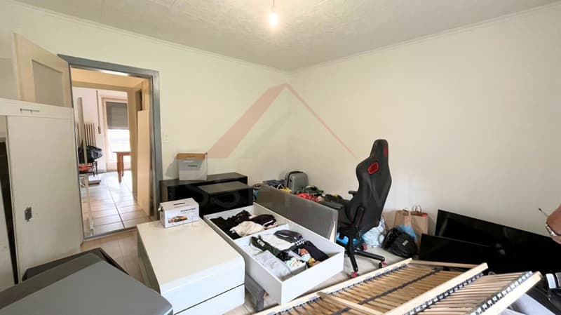 Le Locle - Appartement 3.5 pièces avec balcon, luminosité et beau potentiel (3)