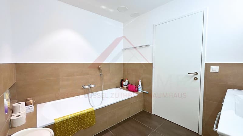 Moderne 5.5-Zimmer-Maisonette mit Loggia, Designküche und Minergie-Standard in zentraler Lage (14)
