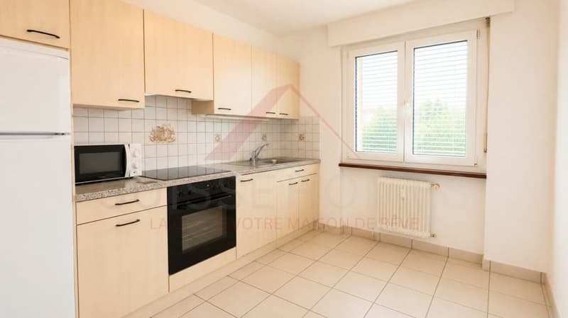 Marly - Appartement 3.5 pièces rénové avec balcon ensoleillé et vue verdoyante (12)
