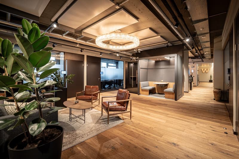 wooden floor, glass walls, chandelier, modern furniture, office space