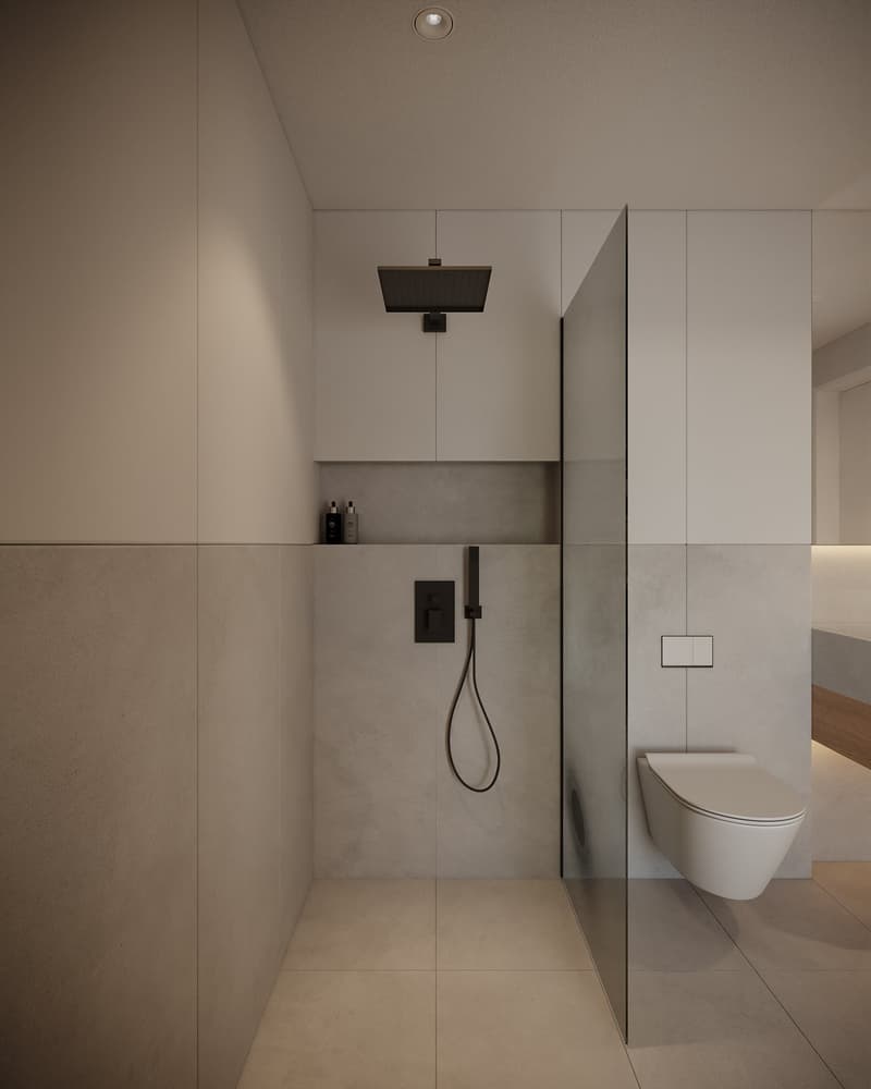 white walls, modern showerhead, glass door, toilet, shampoo bottles, beige tiles, white toilet