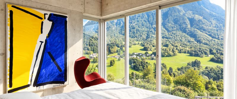 Schlafzimmer mit Panoramaverglasung | Camera da letto con vetrate panoramiche