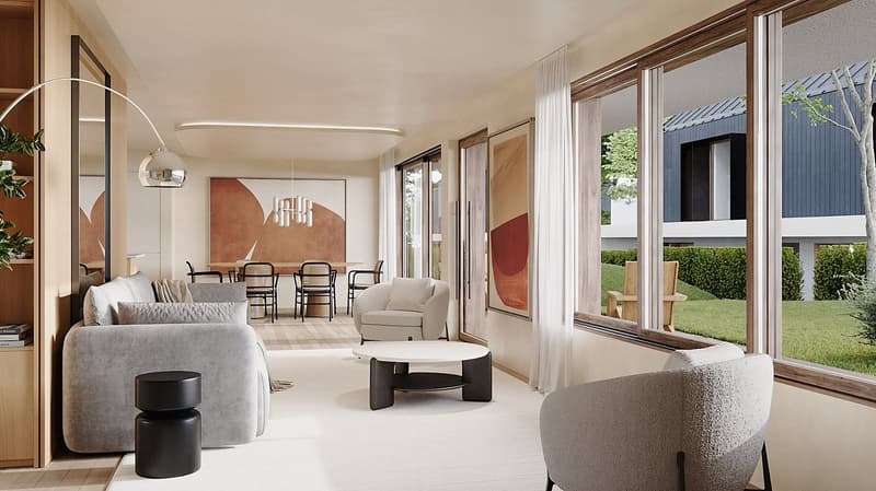 modern and spacious living room with white walls, large windows, grey couch, round coffee table, arched lamp, modern armchair, dining area with table and chairs, two framed pictures on wall, green garden visible through windows