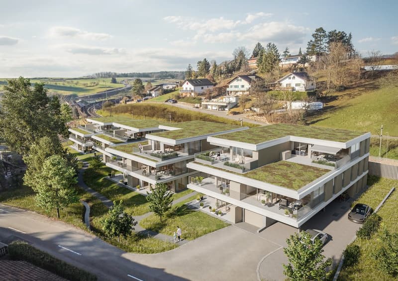 residential building with multiple units, green roof, multiple balconies, raised ground floor, paved road, parking area