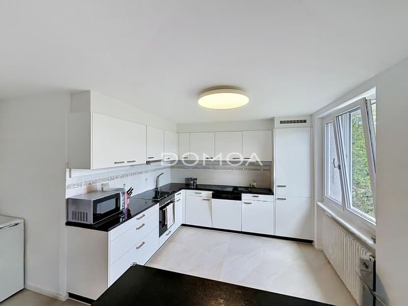 Appartement 5,5 pièces rénové avec rendement - Rez supérieur (6)
