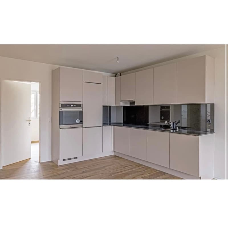 modern kitchen, wooden floor, integrated oven and microwave, kitchen island with sink, mirror-like backsplash