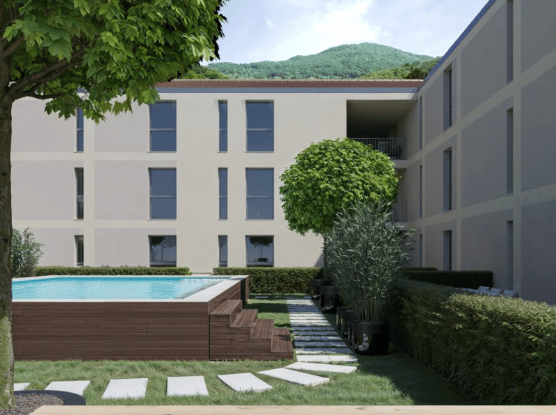 Pool, lawn, bushes, trees, mountain view, building