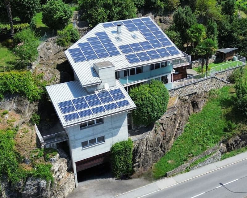 Maison avec un appartement de 5,5 pièces et un appartement de 2 pièces, 2+ places de parking, terrain et panneaux solaires (16)