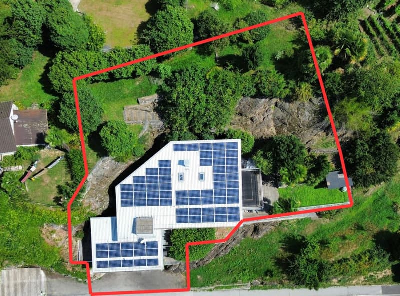Maison avec un appartement de 5,5 pièces et un appartement de 2 pièces, 2+ places de parking, terrain et panneaux solaires (17)