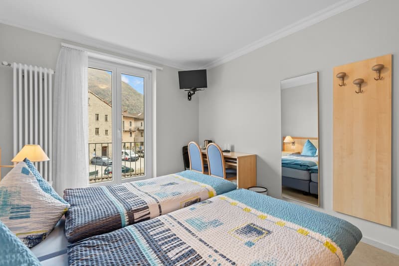 Historic hotel with restaurant, grotto, and building land – a rare opportunity in the heart of Ticino (22)