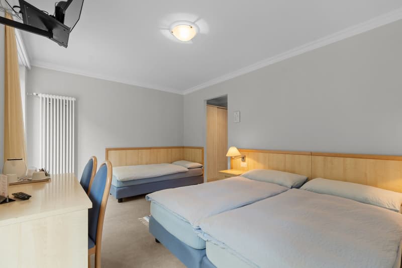 Historic hotel with restaurant, grotto, and building land – a rare opportunity in the heart of Ticino (27)