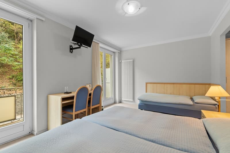 Historic hotel with restaurant, grotto, and building land – a rare opportunity in the heart of Ticino (28)