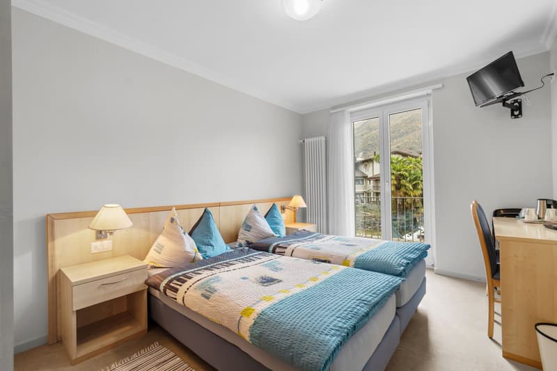 Historic hotel with restaurant, grotto, and building land – a rare opportunity in the heart of Ticino (20)