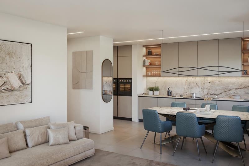 modern living room with a couch, dining table, and a kitchen area with a marble countertop