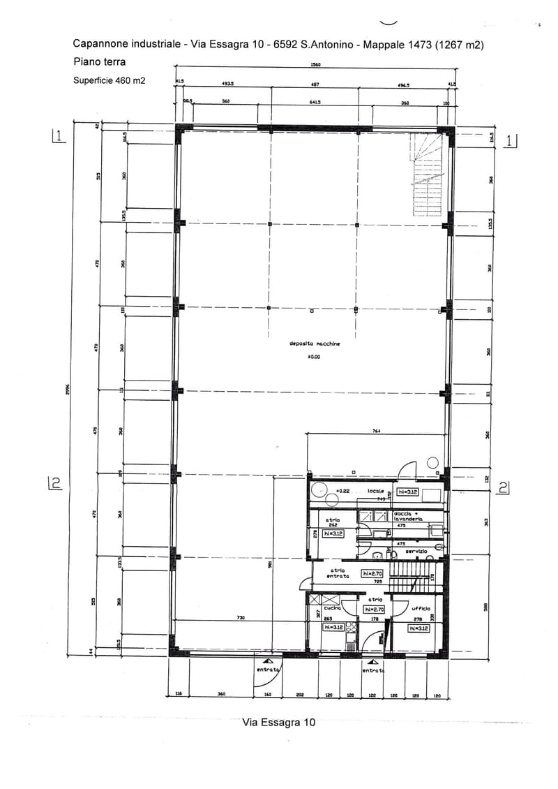 Floor plan of an industrial warehouse with multiple rooms and storage areas.