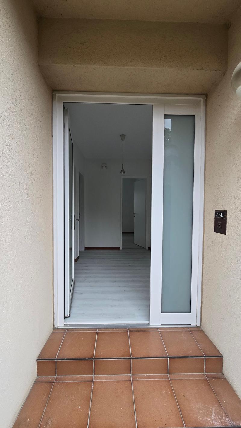 A floor plan showing entry, two doors, light coming in from the top