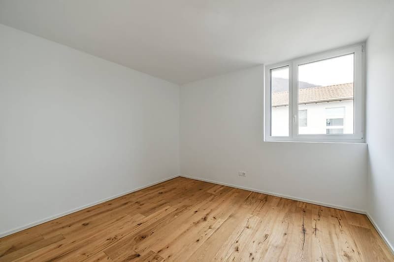empty room, wooden floor, white walls, large window with view