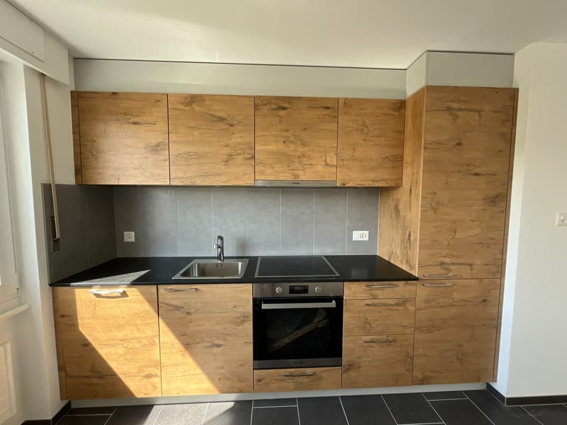 Appartement 3.5 pièces rénové au cœur du Locle (3)