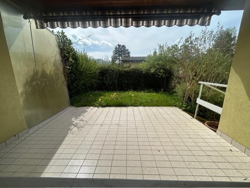tiled floor, awning, small garden, green grass, plants, trees