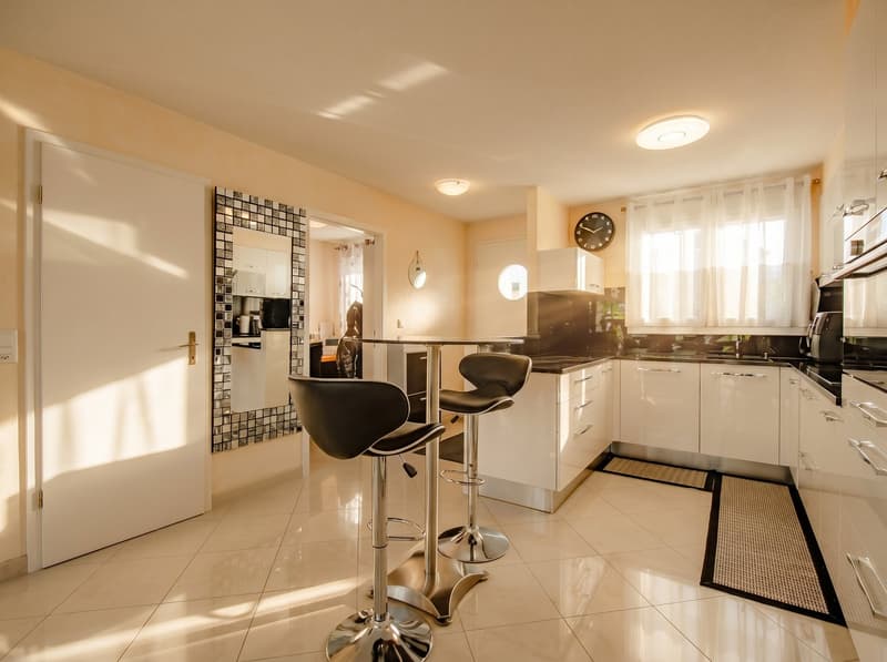 Maison de 6.5 pièces dans un quartier familial recherché (3)