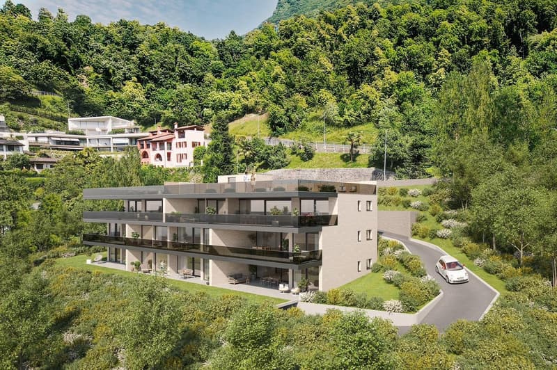 3 story building, balconies, driveway, surrounded by greenery
