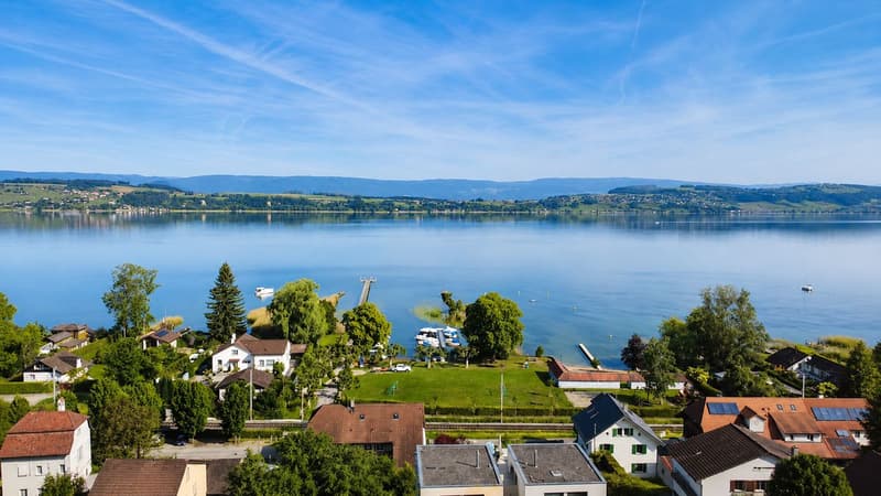 Appartement de 4.5 pièces avec terrasse, jardin privatif et vue sur le lac (7)