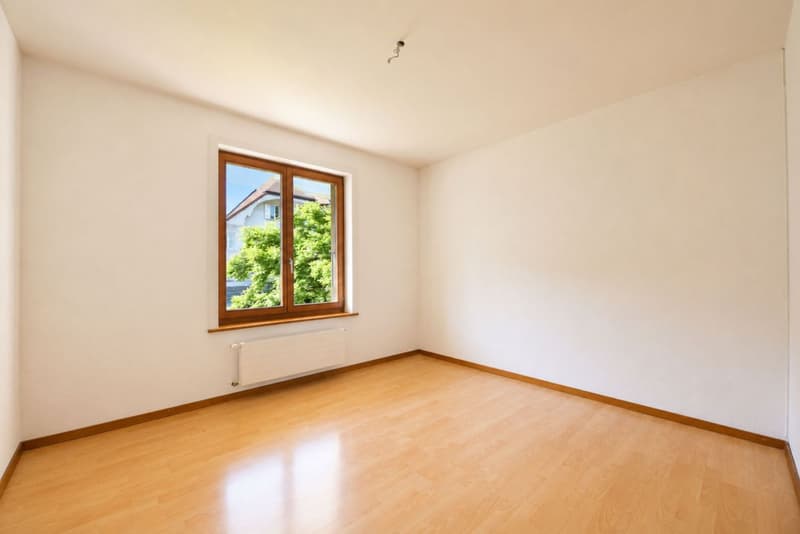 Appartement de 4.5 pièces avec terrasse, jardin privatif et vue sur le lac (5)