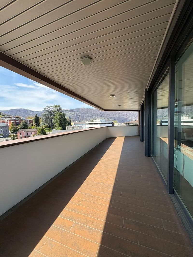 Ufficio all’ultimo piano con potenziale trasformazione in attico, Lugano (4)