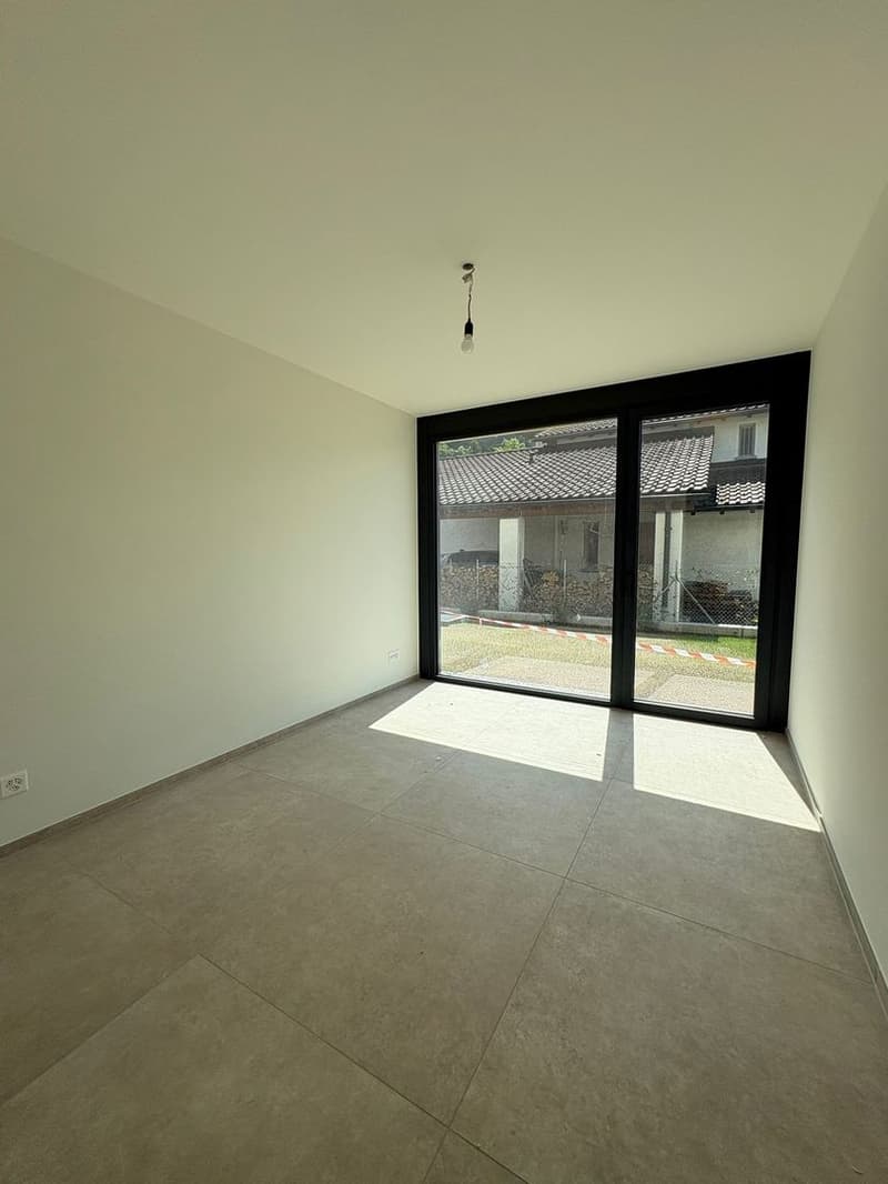 Elegante appartamento di 4.5 locali con giardino privato a Giubiasco (7)