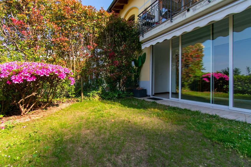 RAFFINATO APPARTAMENTO 4.5 CON GIARDINO IMMERSO NEL VERDE (12)