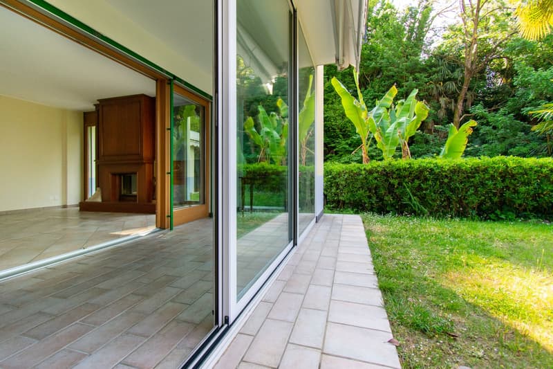 RAFFINATO APPARTAMENTO 4.5 CON GIARDINO IMMERSO NEL VERDE (11)