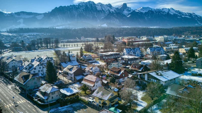 various buildings with snow on the roof