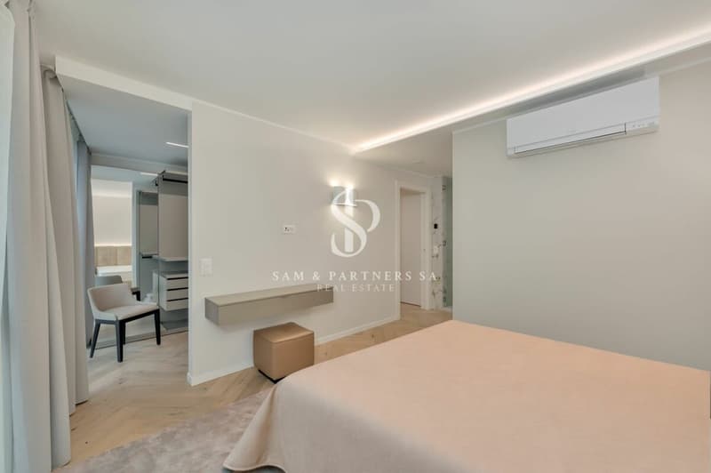 Penthouse con rooftop e vista lago (10)