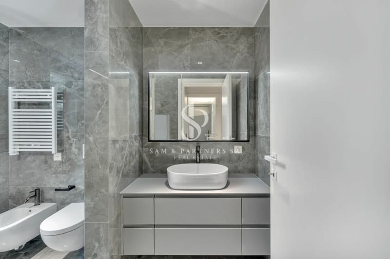 Penthouse con rooftop e vista lago (11)