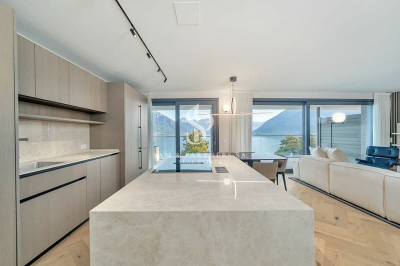 Penthouse con rooftop e vista lago (4)