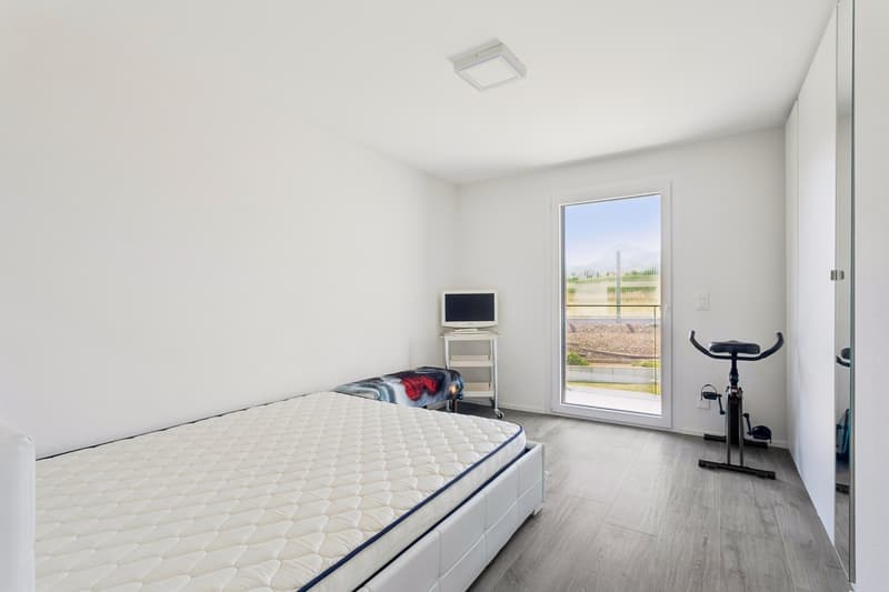 Chambre à coucher avec accès au balcon