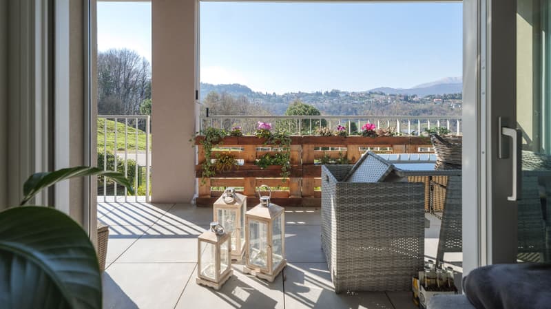 Pratico appartamento di 2.5 locali con bella vista a Pazzallo (2)