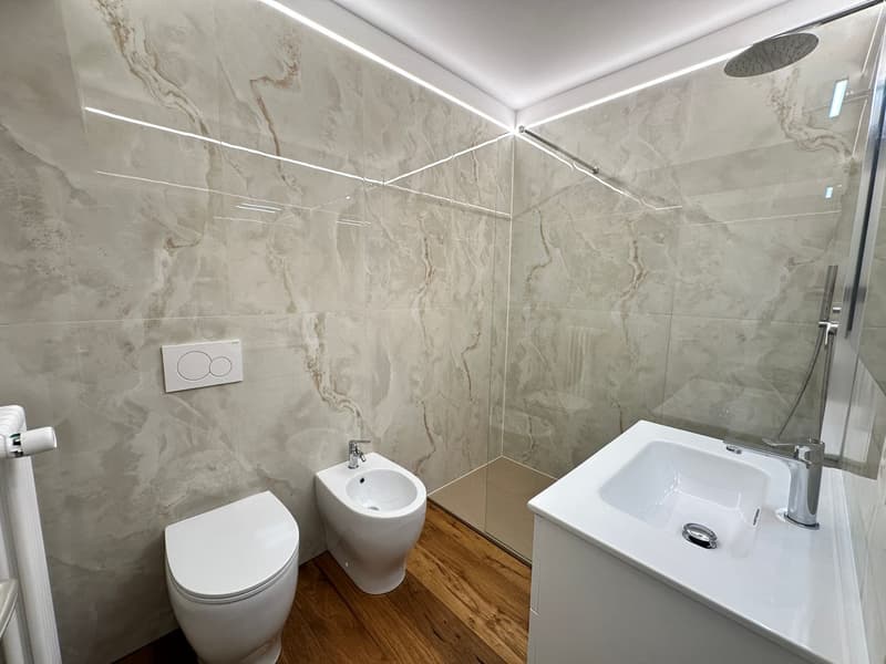 Moderno 2.5 locali con studio, cantina e posto auto esterno (5)