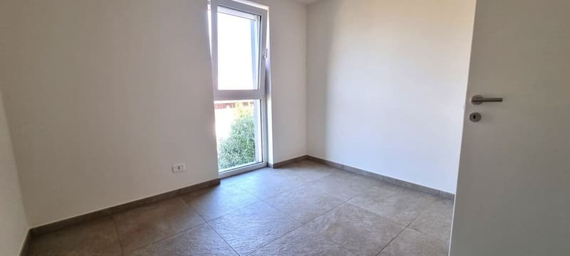 Modern und strategisch gelegene 4.5-Zimmer-Wohnung in Sant'Antonino – Perfekt für alle, die Komfort und Lebensqualität suchen (10)