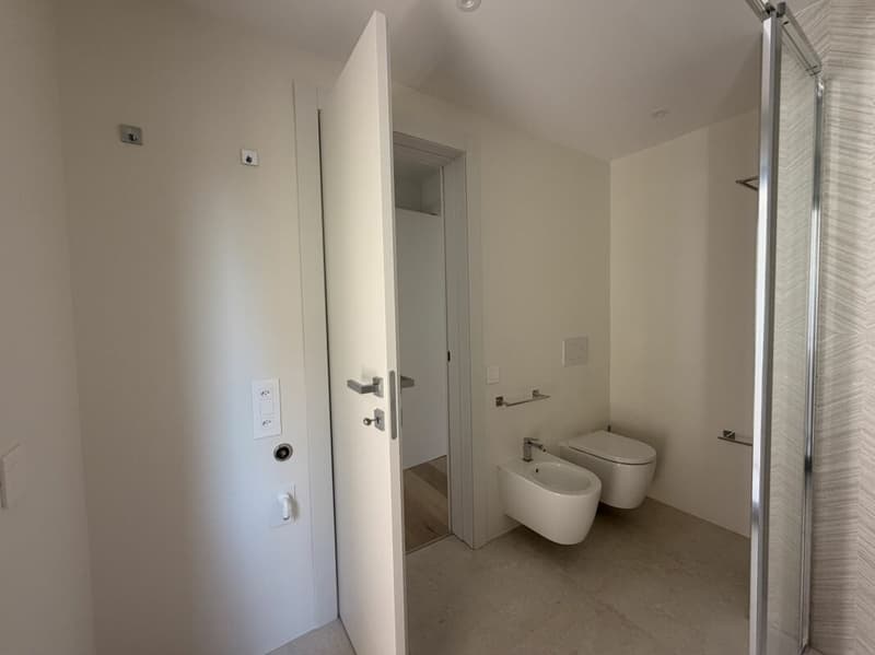 CANOBBIO - FULLY RENOVATED 4.5-ROOM APARTMENT WITH PRIVATE GARDEN, TECHNOLOGY AND COMFORT (19)