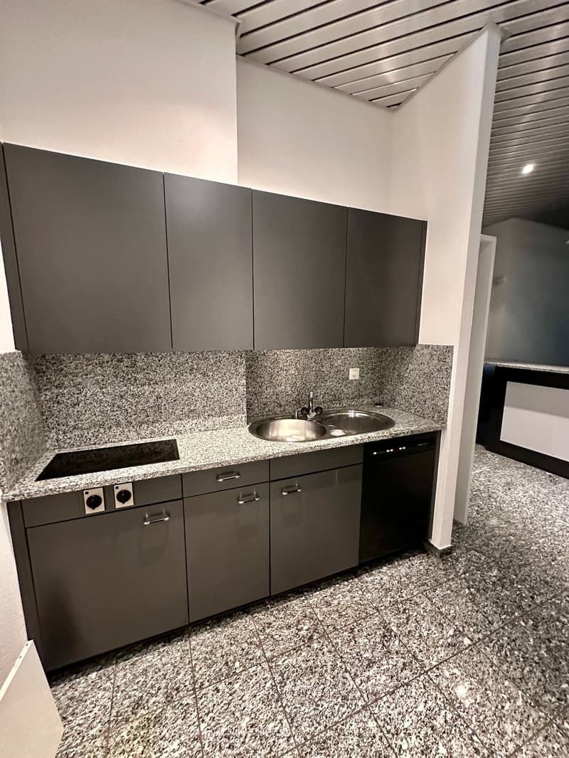modern kitchen with granite countertops, stainless steel sink, electric stove, dishwasher, gray cabinets