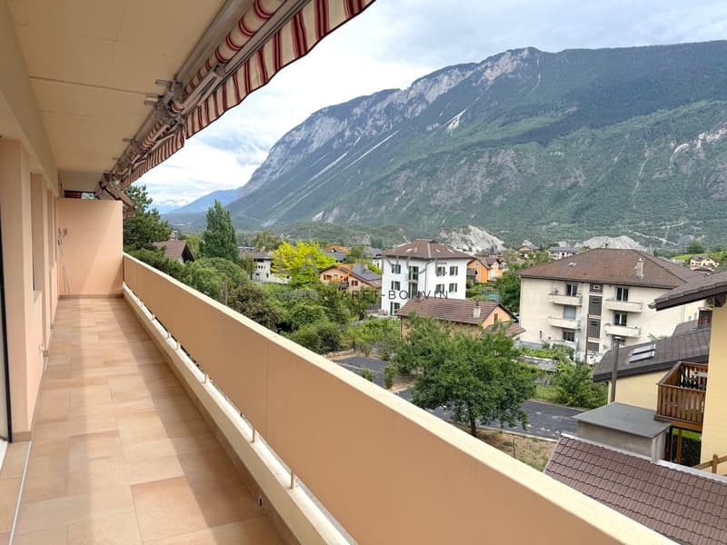 Charmant appartement de 5.5 pièces avec balcon, vue dégagée et jardin (7)